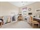 Bright home office featuring a desk, sewing machine, and natural light at 1597 Cambridge Lakes Dr # 303E, Mount Pleasant, SC 29464