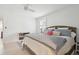 Bright bedroom with a ceiling fan, a wooden framed bed and a small bookcase at 1756 Mchenry Ave, Charleston, SC 29412