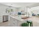 Spacious kitchen with a large island, white cabinetry, and modern appliances at 1756 Mchenry Ave, Charleston, SC 29412