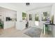 Open-concept kitchen with a wine fridge and convenient access to the outdoor area at 1756 Mchenry Ave, Charleston, SC 29412