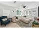 Bright living room featuring a large sectional, area rug, and stylish decor at 1756 Mchenry Ave, Charleston, SC 29412