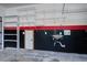 A functional garage including shelving, storage space and a utility sink at 1909 Royal Empress Ct, Charleston, SC 29414