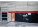 A functional garage including shelving, storage space and a utility sink at 1909 Royal Empress Ct, Charleston, SC 29414