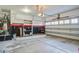 Spacious garage featuring ample storage, shelving and an abundance of natural light at 1909 Royal Empress Ct, Charleston, SC 29414