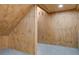 A finished attic featuring wood paneling and open access at 1909 Royal Empress Ct, Charleston, SC 29414