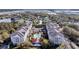 Aerial view of condominiums offering a pool and clubhouse amenities within a beautiful landscape at 1984 Folly Rd # A306, Charleston, SC 29412