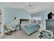 Bright bedroom featuring vaulted ceilings, a comfortable bed, and coastal-inspired decor at 1984 Folly Rd # A306, Charleston, SC 29412