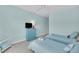 Cozy bedroom with two twin beds, soft lighting, and ample space for relaxing at 1984 Folly Rd # A306, Charleston, SC 29412