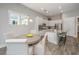 Bright eat-in kitchen featuring stainless appliances, granite counters, and a tile floor at 2010 Redback Dr, Summerville, SC 29483