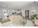 Bright living room featuring neutral tones, a comfortable couch and modern decor at 2010 Redback Dr, Summerville, SC 29483