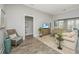 Comfortable living room featuring tile flooring and ample natural light at 2010 Redback Dr, Summerville, SC 29483
