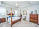 Bright main bedroom with trey ceiling and four-poster bed at 2010 Redback Dr, Summerville, SC 29483