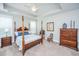 Bright main bedroom with trey ceiling and comfortable furnishings at 2010 Redback Dr, Summerville, SC 29483