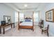 Comfortable main bedroom featuring a four-poster bed, trey ceiling, and ceiling fan at 2010 Redback Dr, Summerville, SC 29483
