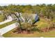 Aerial view of home showcasing the landscaping, fenced yard, and neighborhood at 2036 Yaupon Way, Johns Island, SC 29455