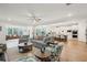 Open-concept living room leading to kitchen and additional gathering spaces at 2036 Yaupon Way, Johns Island, SC 29455