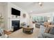 Spacious living room with fireplace and view to other rooms at 2036 Yaupon Way, Johns Island, SC 29455