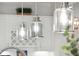 Close up on the pendant lights over the kitchen island at 2036 Yaupon Way, Johns Island, SC 29455