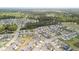 Extensive aerial view of the community featuring a lush green landscape and several small ponds at 204 Corvus St, Summerville, SC 29483