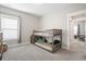 Bedroom with gray carpet, a wooden bunk bed and natural lighting at 204 Corvus St, Summerville, SC 29483