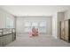 Brightly lit bedroom with gray carpet, bunk beds, neutral wall color and ample sunlight at 204 Corvus St, Summerville, SC 29483