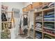 Walk-in closet with custom shelving, clothing racks, and ample storage space at 204 Corvus St, Summerville, SC 29483