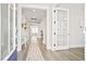 Inviting foyer with an open layout, featuring hardwood floors, natural light, and modern decor at 204 Corvus St, Summerville, SC 29483