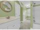 Bathroom featuring a white vanity and shower-tub combination at 2093 Rookery Ln, Charleston, SC 29414
