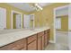 Bathroom with a large vanity, big mirror and three doors at 2093 Rookery Ln, Charleston, SC 29414