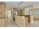 Open-concept kitchen with stainless steel appliances, a center island, and a view to the breakfast area at 2093 Rookery Ln, Charleston, SC 29414