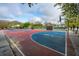 Outdoor basketball court with hoops and colorfully painted surface at 21 Hester St # Apt 12, Charleston, SC 29403