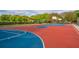 Community basketball court with multiple hoops and gathering spaces at 21 Hester St # Apt 12, Charleston, SC 29403