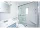 Remodeled bathroom featuring subway tile, glass shower enclosure, and modern fixtures at 21 Hester St # Apt 12, Charleston, SC 29403