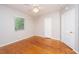 Bedroom featuring hardwood floors, neutral paint, a ceiling fan, and bright windows at 21 Hester St # Apt 12, Charleston, SC 29403