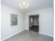 Dining area with tile flooring, a light fixture, and a window letting in natural light at 21 Hester St # Apt 12, Charleston, SC 29403