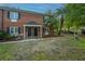 Attractive brick townhomes with black doors, landscaped grounds, and well-maintained exteriors at 21 Hester St # Apt 12, Charleston, SC 29403