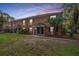 Beautiful brick townhomes with manicured lawn and inviting entrances create a welcoming atmosphere at 21 Hester St # Apt 12, Charleston, SC 29403