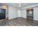 Inviting living room features wood-look flooring, ceiling fan, and a bright, neutral color palette at 21 Hester St # Apt 12, Charleston, SC 29403
