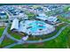 Aerial view of the community pool with a lazy river, clubhouse, and surrounding residences at 211 Clearpath Dr, Summerville, SC 29486