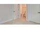 Bright bathroom visible through an open door, featuring a toilet and combination tub and shower at 214 Garden Gate Way, Summerville, SC 29486