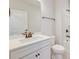Neutral bathroom with white vanity, quartz counter and tub/shower with tile surround at 214 Garden Gate Way, Summerville, SC 29486