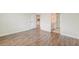 Primary bedroom featuring hardwood floors and ensuite bathroom at 214 Garden Gate Way, Summerville, SC 29486