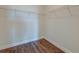 Spacious walk-in closet featuring wood floor, white trim and white wire shelving at 214 Garden Gate Way, Summerville, SC 29486