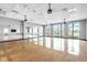 Spacious dance studio with hardwood floors, mirrored wall, and bright lighting at 214 Garden Gate Way, Summerville, SC 29486
