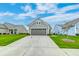 Charming single-Gathering home with a well-maintained lawn and a two-car garage at 214 Garden Gate Way, Summerville, SC 29486