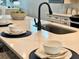 A kitchen island with a modern faucet and sink at 214 Garden Gate Way, Summerville, SC 29486