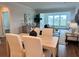 Open concept living and dining areas with hardwood floors and lots of natural light at 214 Garden Gate Way, Summerville, SC 29486