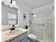 Bathroom featuring a large vanity, modern finishes, and a walk-in shower with a glass door at 2196 Spoleto Ln, North Charleston, SC 29406