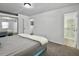 Spacious bedroom with a large closet, neutral carpet, and ensuite bath access at 2196 Spoleto Ln, North Charleston, SC 29406