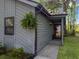 Inviting home exterior with a fern and visible house number near the entrance at 2196 Spoleto Ln, North Charleston, SC 29406